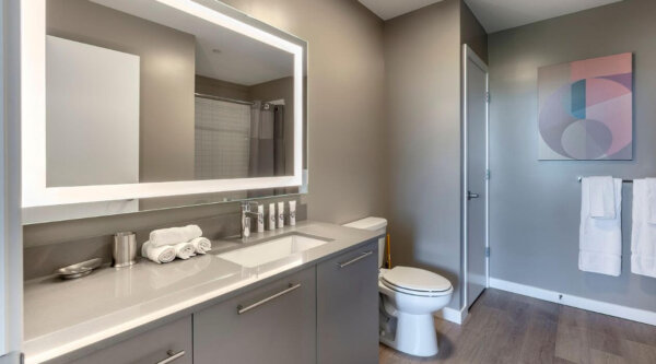 Modern bathroom at Escape at Harbor Point by Compass Furnished Apartments