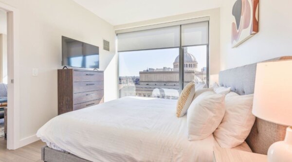 Bright bedroom at 30 Dalton by Compass Furnished Apartments