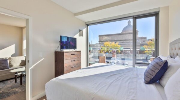 Bright bedroom at 30 Dalton by Compass Furnished Apartments