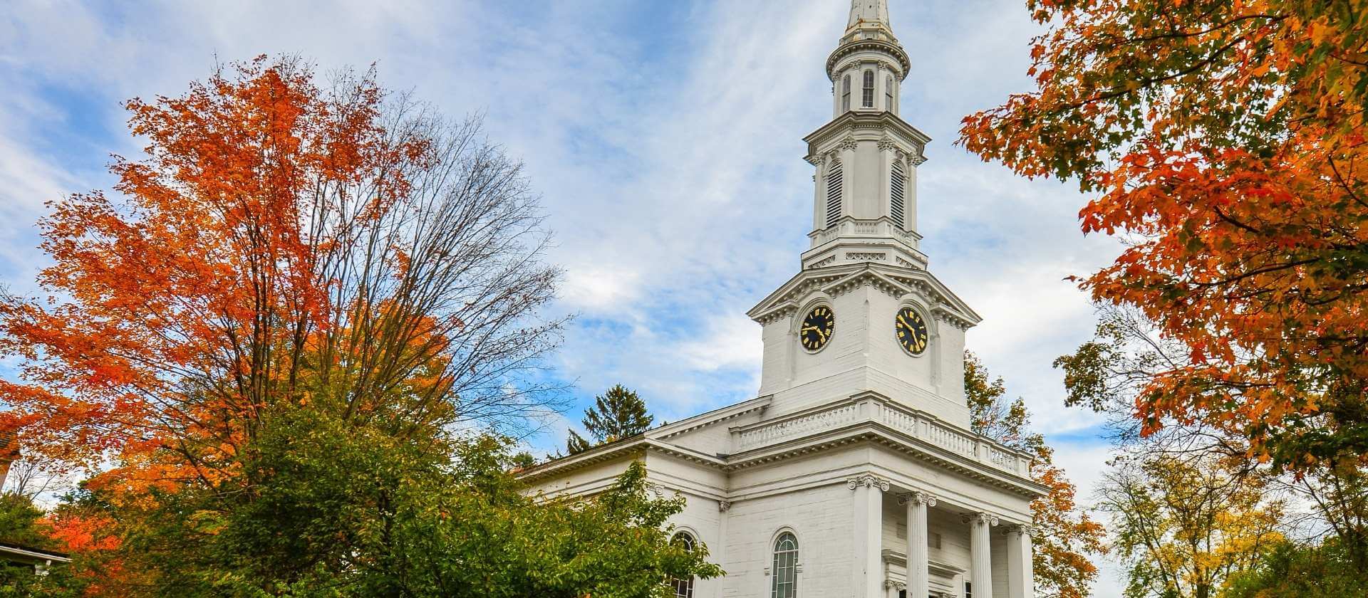 Autumn leaves and a church tower