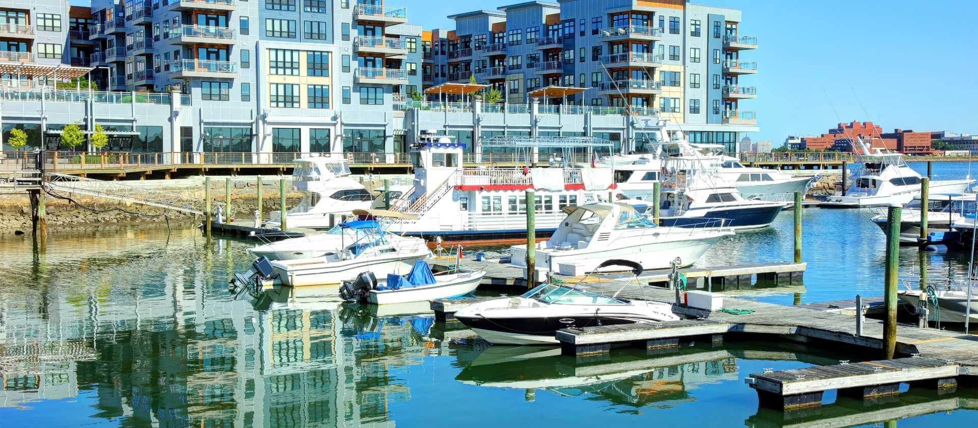 Boats moored along a marina in Quincy