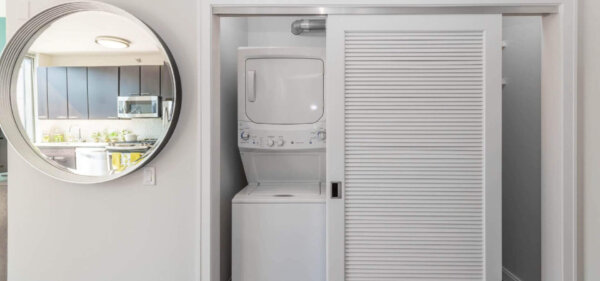Laundry room at State & Chestnut, a Compass Furnished Apartments property