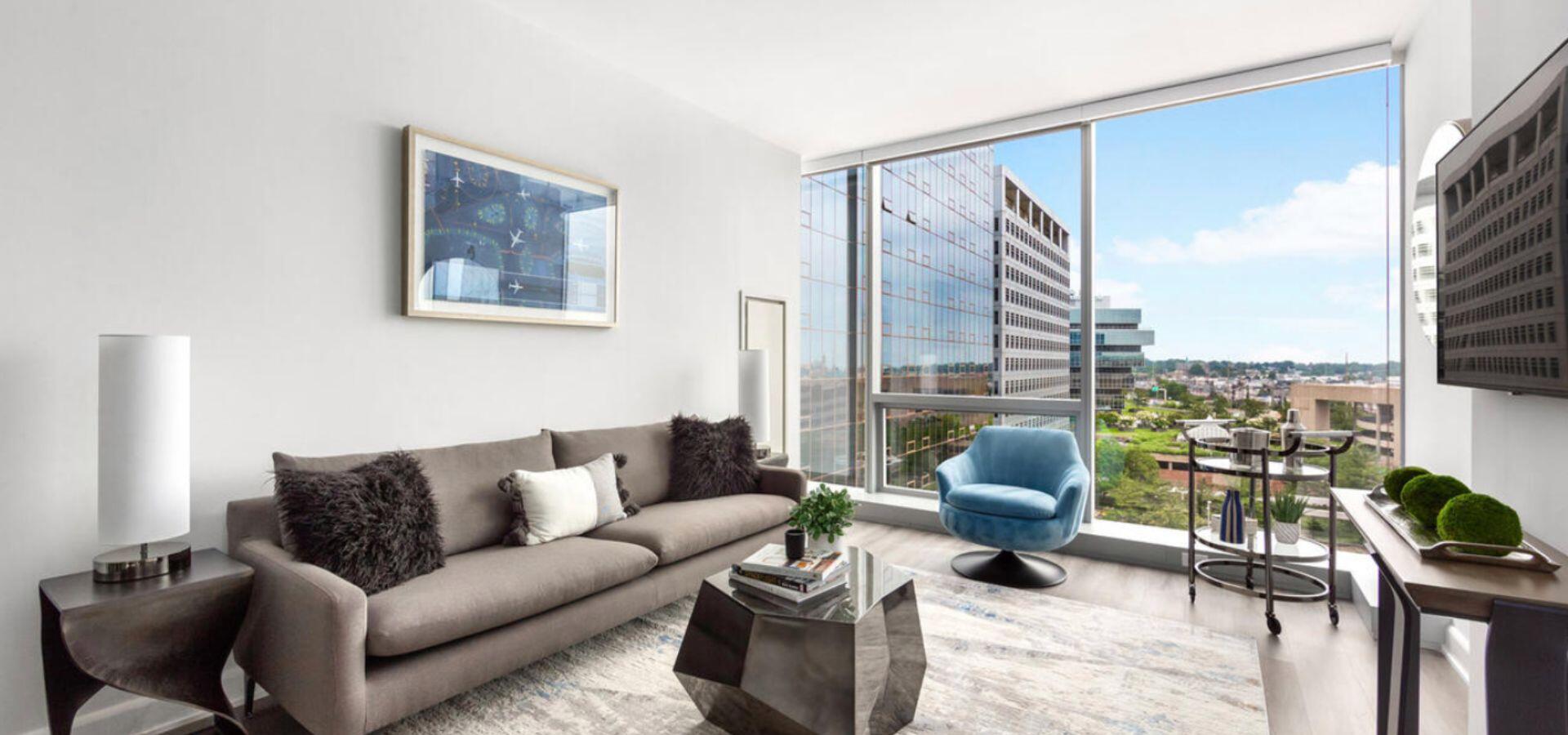 Living Room at Atlantic Station West, a Compass Furnished Apartments residence 1