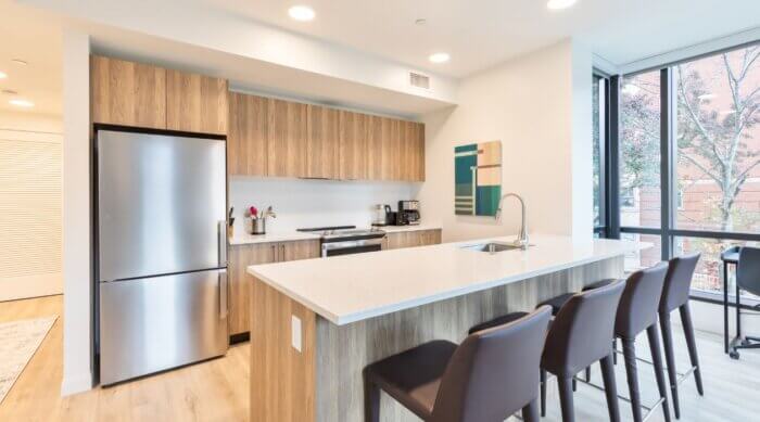 Sleek modern kitchen in a Compass Furnished Apartment at Idyl Fenway