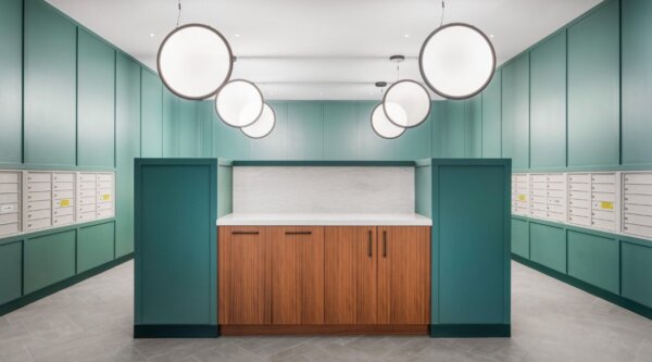 Modern mailroom at Idyl Fenway by Compass Furnished Apartments