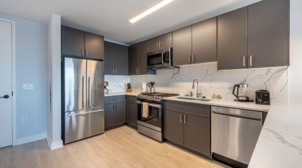 Modern kitchen at 3Thirty3 by Compass Furnished Apartments