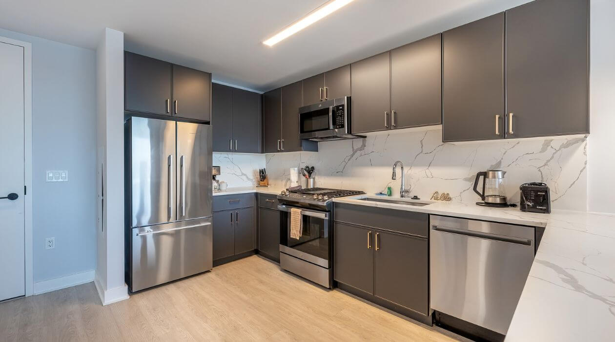 Modern kitchen at 3Thirty3 by Compass Furnished Apartments