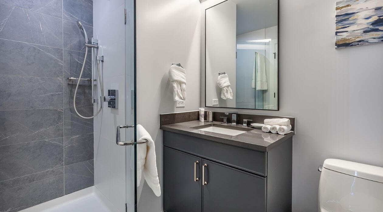 Modern bathroom at 3Thirty3 by Compass Furnished Apartments
