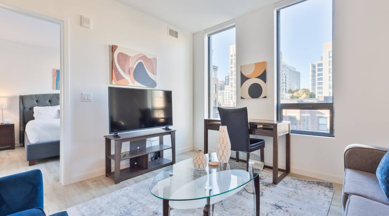 Modern furnished living room at Compass Furnished Apartments in Idyl Fenway.