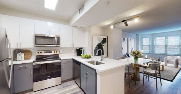 Contemporary kitchen and dining space at Andover House by Compass Furnished Apartments