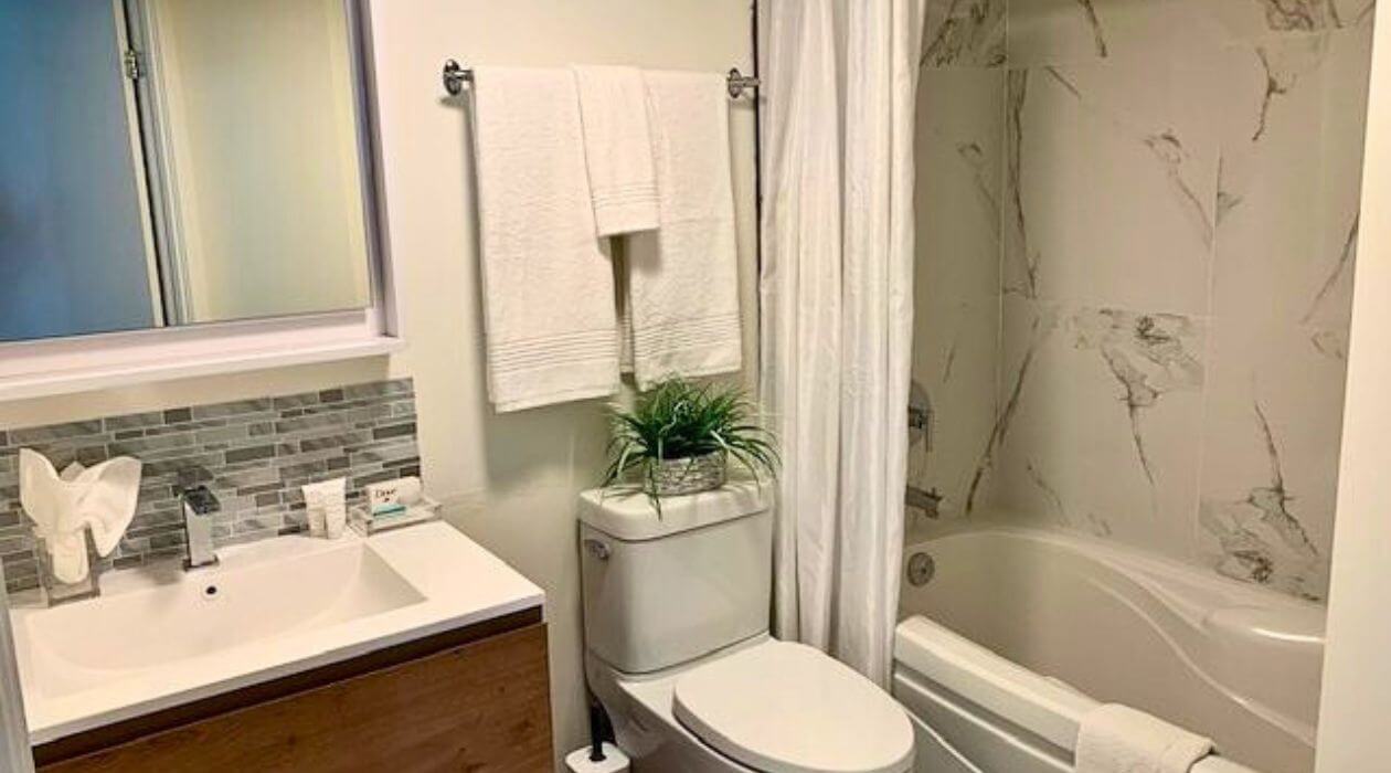 Modern bathroom at Compass Furnished Apartments’ Skydome City