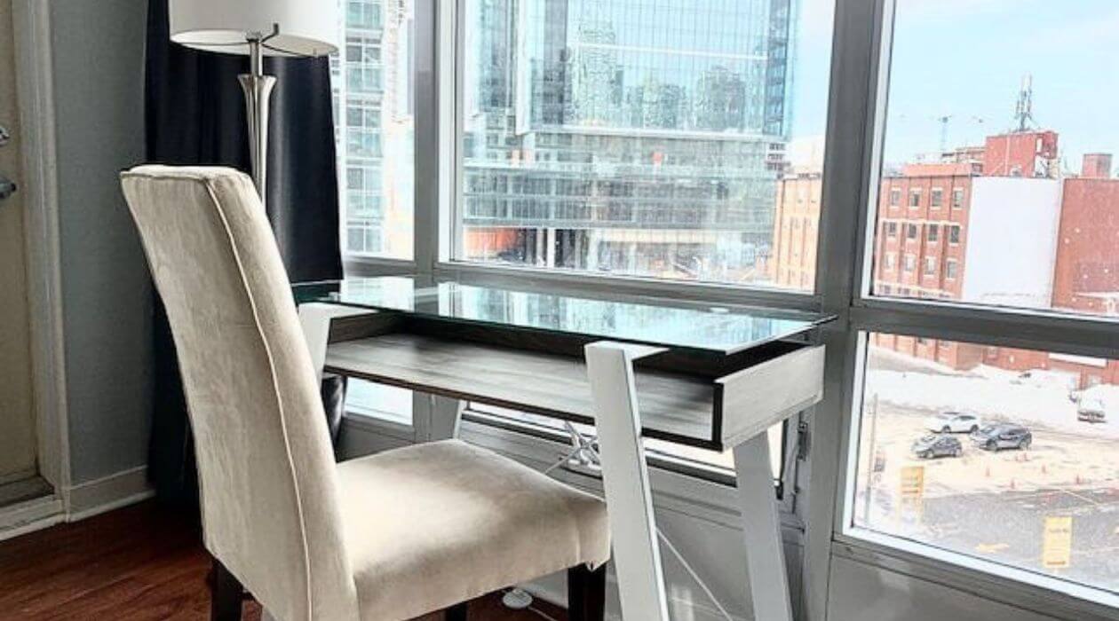 Work-from-home desk setup at Compass Furnished Apartments’ Skydome City