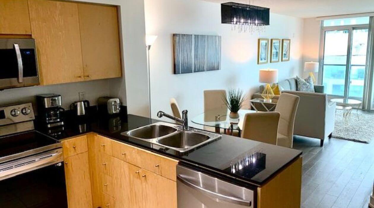 Modern furnished apartment at Compass Furnished Apartments’ Skydome City location