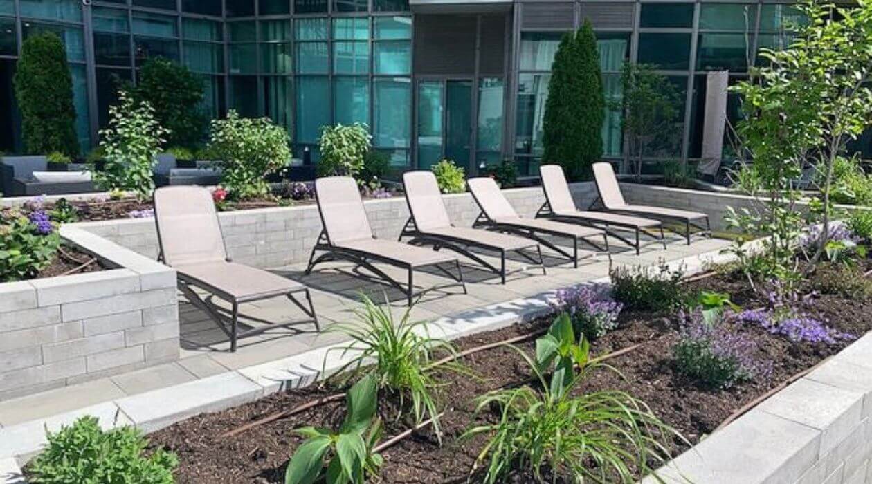 Outdoor garden terrace at Compass Furnished Apartments’ Skydome City property