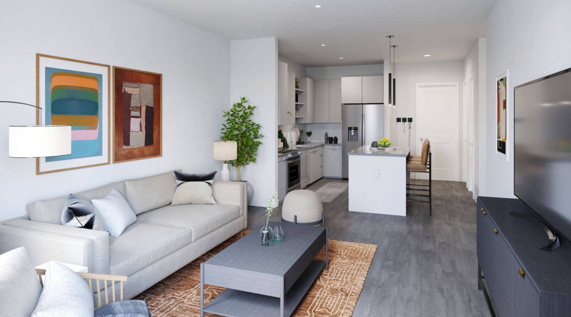 Bright, modern living room and kitchen at The 305 – Compass Furnished Apartments