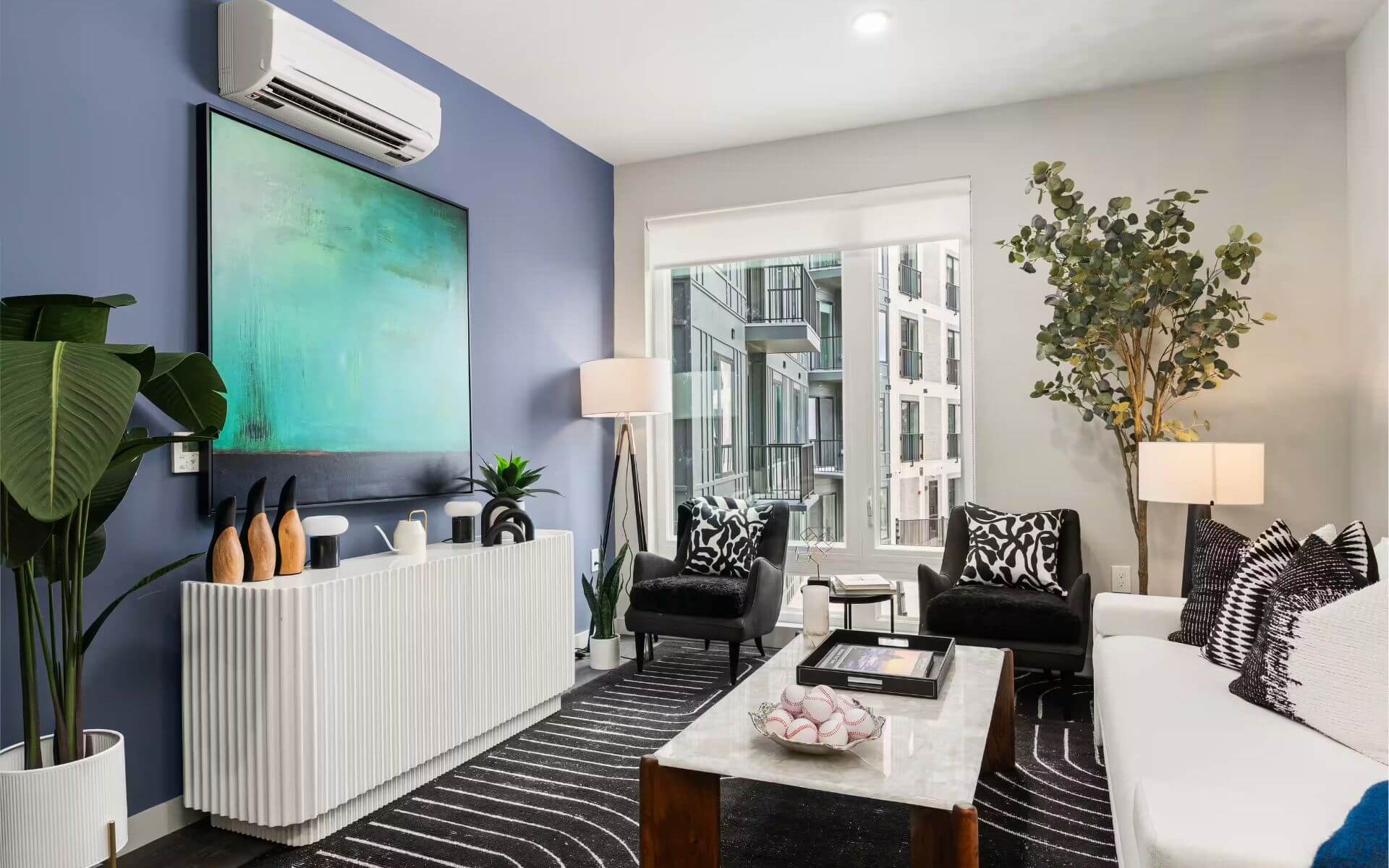 Contemporary living room at 51 South by Compass Furnished Apartments