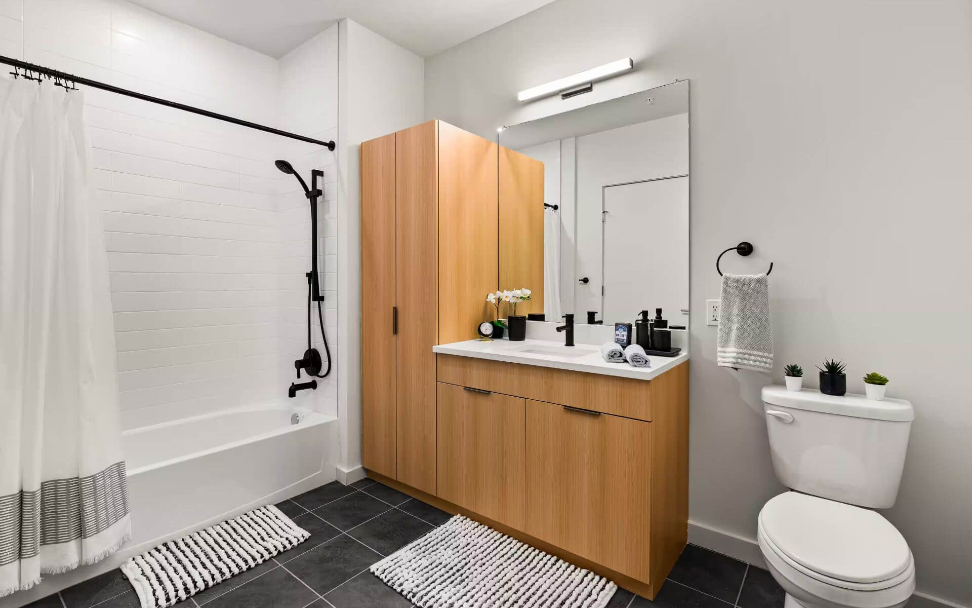 Sleek bathroom at 51 South by Compass Furnished Apartments