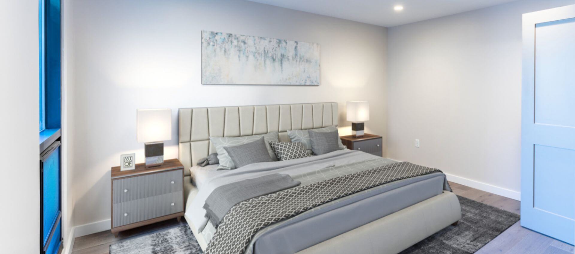 Modern bedroom at 244 Hanover with a stylish headboard, dual nightstands, and cozy lighting.