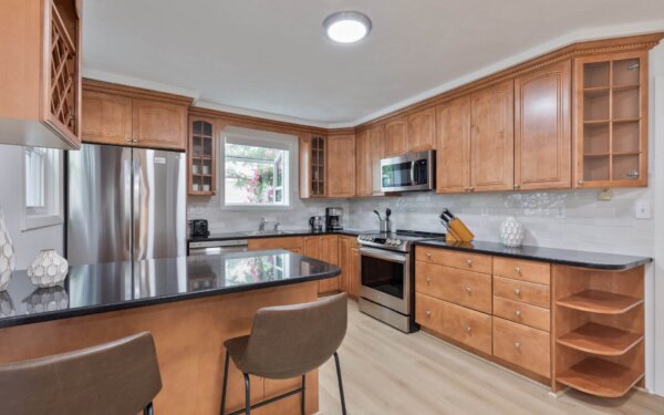 Modern kitchen at Compass Furnished Apartments, 235 Cardinal Medeiros