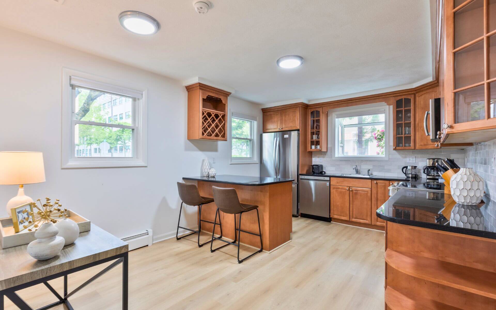 Bright, fully equipped kitchen at Compass Furnished Apartments, 235 Cardinal Medeiros