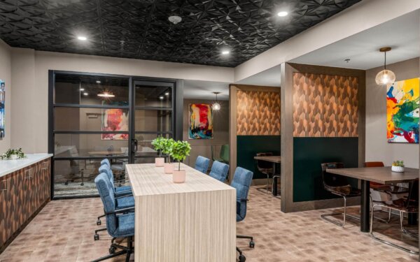 Sleek co-working lounge at The Revel by Compass Furnished Apartments