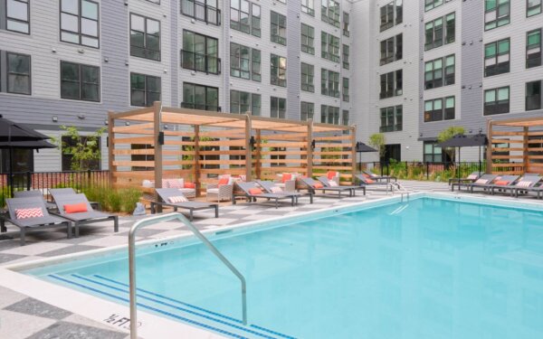 Refreshing outdoor pool at The Pennant at North Crossing by Compass Furnished Apartments