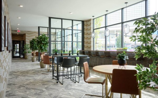 Open and inviting lounge at The Pennant at North Crossing by Compass Furnished Apartments