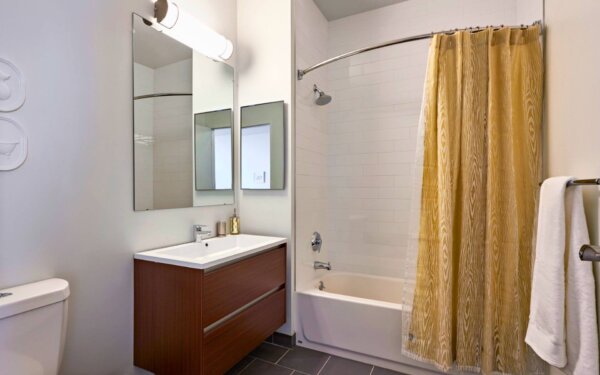 Modern bathroom at 777 Main by Compass Furnished Apartments