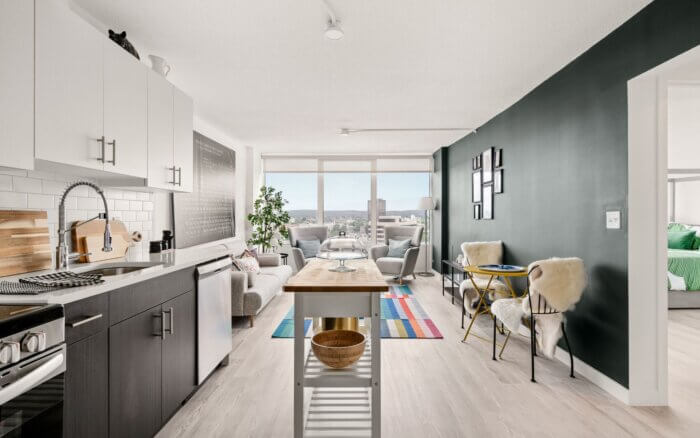 Bright, open-concept apartment at The Revel by Compass Furnished Apartments