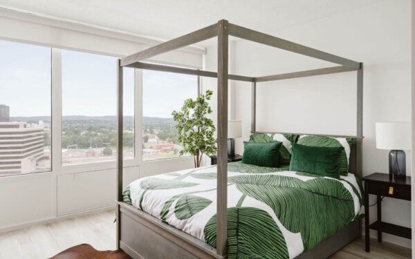 Stylish bedroom in The Revel by Compass Furnished Apartments